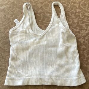 Small cropped tank top out from under